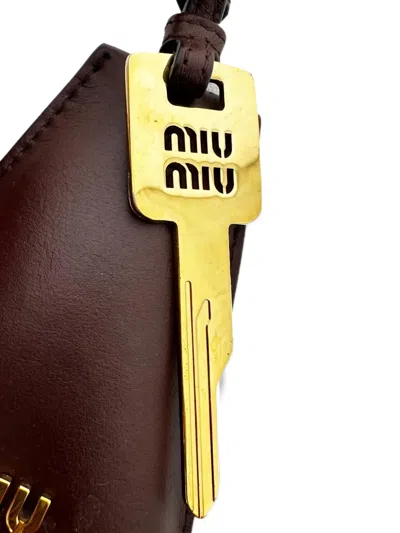Pre-owned Miu Miu Trick Pelle Bag Charm In Brown