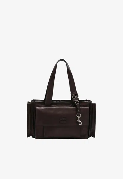Miu Miu Utilitaire Aged Leather Shoulder Bag In Brown