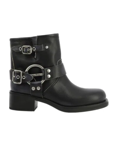 MIU MIU MIU MIU VINTAGE-LOOK LOGO-ENGRAVED ANKLE BOOTS