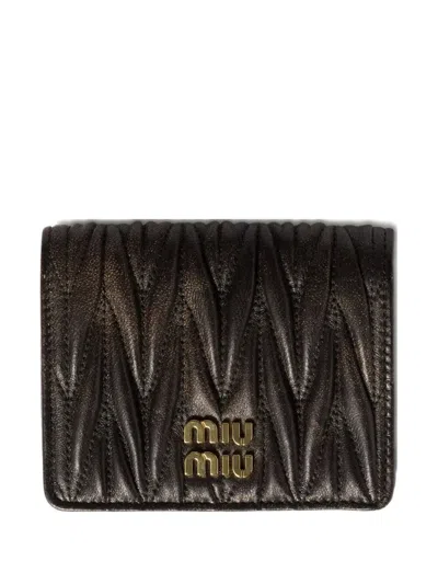 Miu Miu Vintage Treatment Matelassé Nappa Leather Small Wallet In Brown
