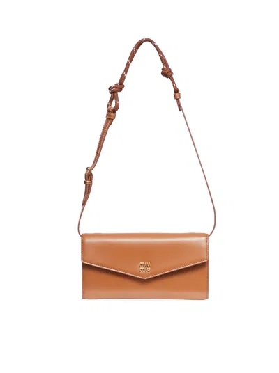 Miu Miu Wallet With Leather And Rope Shoulder Strap In Brown