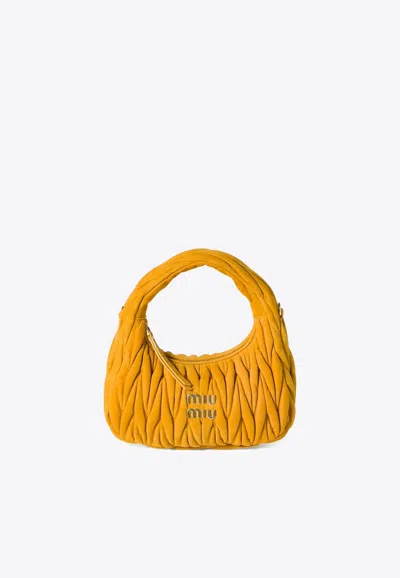 Miu Miu Wander Matelassé Suede Top Handle Bag In Yellow