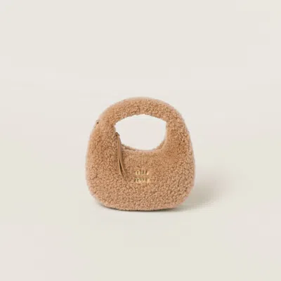 Miu Miu Wander Shearling Hobo Bag With Leather Details In Caramel