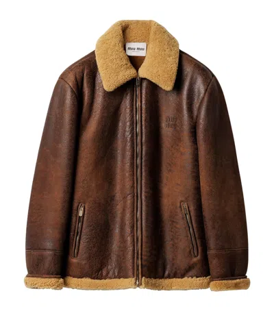 Miu Miu Waxed Leather Shearling-trim Jacket In Brown