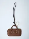 Miu Miu Leather Keyring Top Handle In Brown