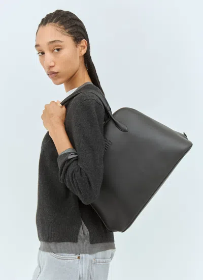 Miu Miu Women Logo Embossed Leather Handbag In Black