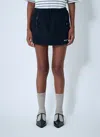 Miu Miu Fleece Miniskirt With Drawstring Waist And Zip Pockets In Black