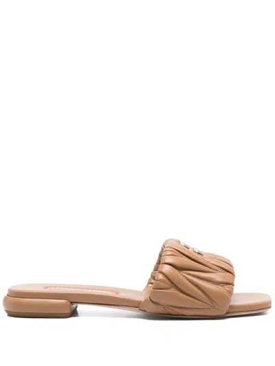 MIU MIU MIU MIU WOMEN MATELASSÉ LEATHER FLAT SANDALS