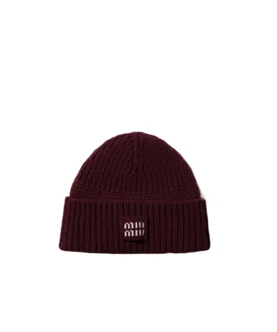 Miu Miu Wool And Cashmere Beanie In Amaranth