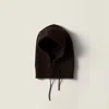 Miu Miu Cashmere Wool Knitted Ribbed Hat In Brown