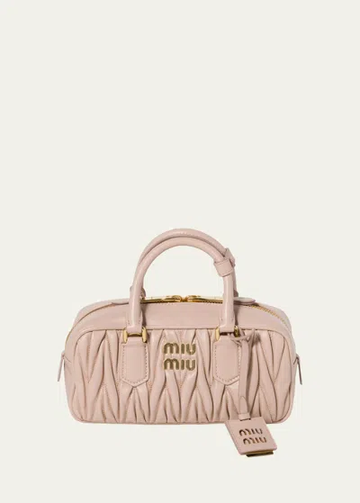 Miu Miu Zip Quilted Leather Top-handle Bag In F0236 Cipria