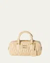Miu Miu Zip Quilted Leather Top-handle Bag In F0k57 Soia