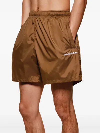 Mki Miyuki Zoku Elasticated-waist Swim Shorts In Brown