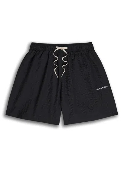 MKI MIYUKI ZOKU MKI MIYUKI ZOKU LOGO-EMBROIDERED SEERSUCKER SHORTS