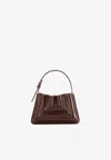 Mlouye Sera Patent Leather Bag Charm In Brown