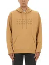 Mm6 Maison Margiela Mm6 By Maison Margiela Relaxed-fit Cotton Hoodie With Unique Graphic Print In Brown