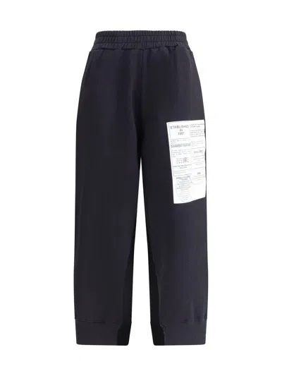 Mm6 Maison Margiela Black Track Pants With Cut-out Details In Blue
