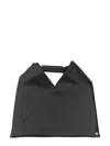Mm6 Maison Margiela Mm6 By Maison Margiela Asymmetrical Black Mini Bag With Distinctive Handle In Black