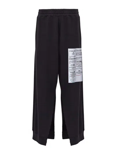 Mm6 Maison Margiela Jeans Acampanados - Negro In Black