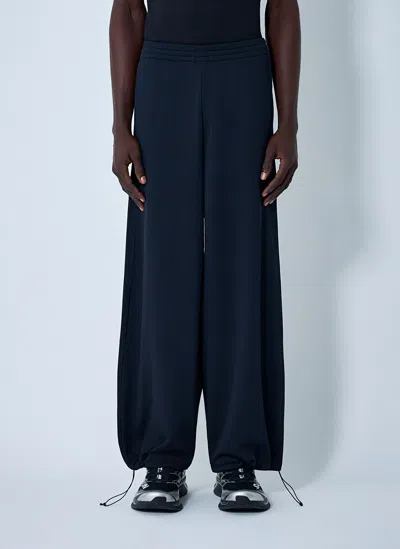 Mm6 Maison Margiela Logo Motif Pants In Black