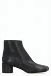 Mm6 Maison Margiela Minimalist Black Leather Ankle Boots With Rounded Toe In Black