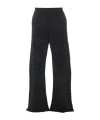 Mm6 Maison Margiela Wide Leg Elastic Waist Trousers With Distressed Detailing In Black