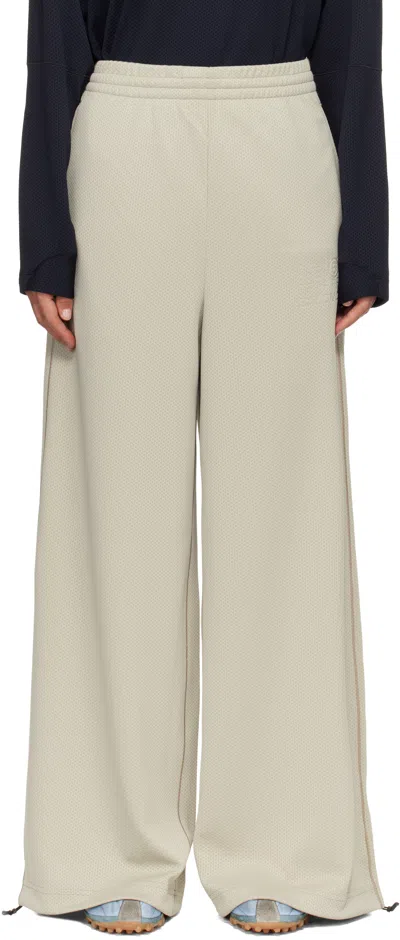 Mm6 Maison Margiela Off-white Salomon Edition Mesh Sweatpants In Neutral