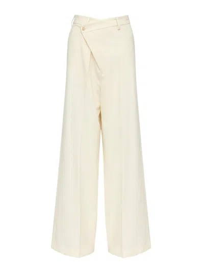MM6 MAISON MARGIELA PANTS WITH DECENTRALIZED CLOSURE