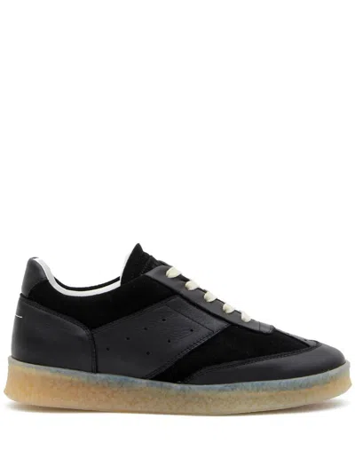 MM6 MAISON MARGIELA MM6 MAISON MARGIELA SNEAKERS MM6 MAISON MARGIELA.
MODEL "6 COURT" IN BLACK LEATHER AND SUEDE PANELS.