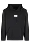 Mm6 Maison Margiela Mm6 By Maison Margiela Emblazoned Black Hoodie With Drawstring And Ribbed Finishes In Black