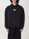 Mm6 Maison Margiela Mm6 By Maison Margiela Emblazoned Black Hoodie With Drawstring And Ribbed Finishes In Black