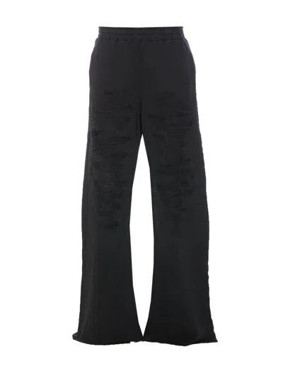 Mm6 Maison Margiela Wide Leg Elastic Waist Trousers With Distressed Detailing In Black