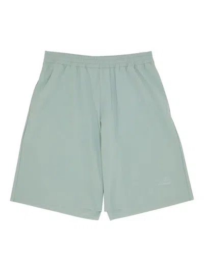 MM6 MAISON MARGIELA MM6 MAISON MARGIELA X SALOMON X SALOMON SHORTS WITH NUMERICAL GRAPHICS