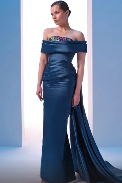Mnm Couture Off Shoulder Column Gown With Side Drape In Blue