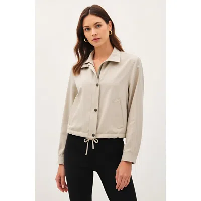 Modenaire Cropped Utility Jacket With Snap Buttons And Adjustable Drawstring Hem In Neutral