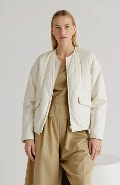 Modenaire Diamond Quilted Zip-front Jacket With Flap Pockets And Clean Collarless Cut In White