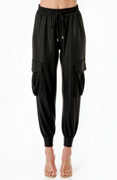 Modenaire Faux Leather Cargo Drawstring Jogger Pants In Black