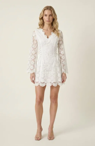 Modenaire Floral Applique Long Sheer Sleeve Lace-up Mini Dress In White