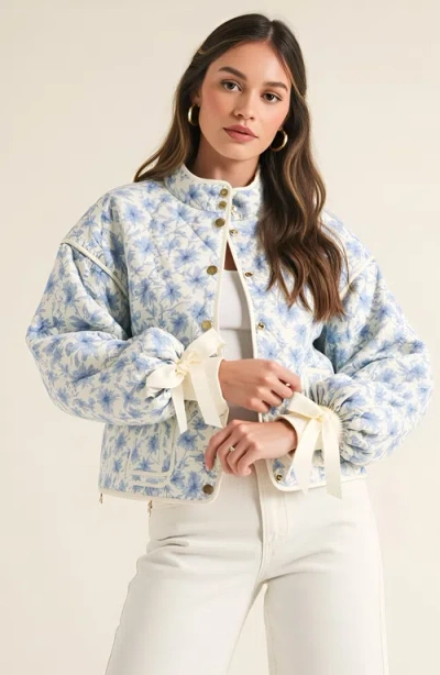 Modenaire Floral Quilted Jacket With Puff Sleeves And Satin Bow Cuffs In Blue