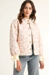 Modenaire Floral Quilted Jacket With Puff Sleeves And Satin Bow Cuffs In Metallic