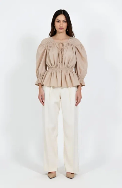 Modenaire Gathered Peplum Tie-front Puff-sleeve Blouse In Nude