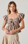 Modenaire Gingham Peplum Top With Flutter Sleeves And Front Tie Detail In Brown
