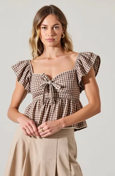 Modenaire Gingham Peplum Top With Flutter Sleeves And Front Tie Detail In Brown