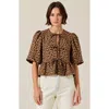 Modenaire Peplum Top With Front Tie Closures And Short Puff Sleeves In Leopard Print
