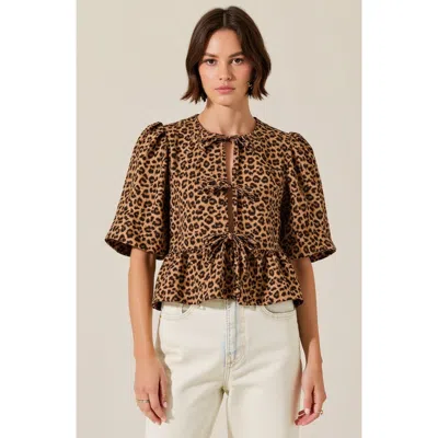 Modenaire Peplum Top With Front Tie Closures And Short Puff Sleeves In Leopard Print