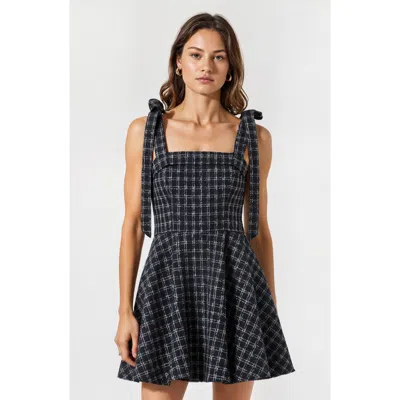 Modenaire Plaid Mini Dress With Tie-strap Shoulders And Square Neckline In Black/white Plaid