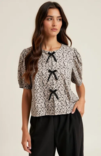 Modenaire Puff Sleeve Blouse With Velvet Bow Accents And Crew Neckline In Multi