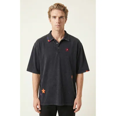 Modenaire Relaxed Fit Floral Embroidered Polo Shirt With Washed Finish In Black