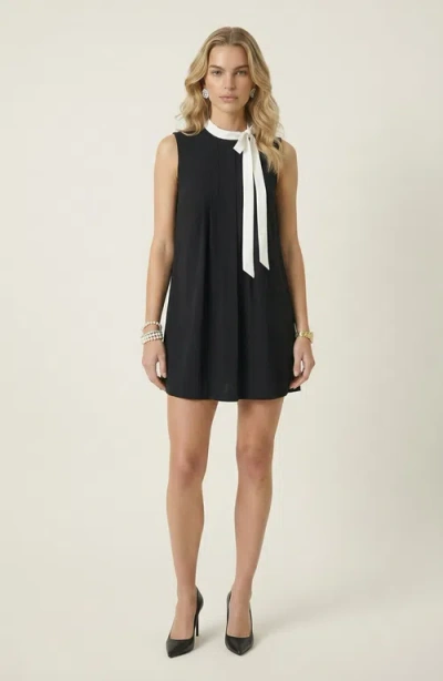 Modenaire Sleeveless Shift Dress With Contrast Tie Neck And Pleat Detail In Multi
