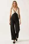 Modenaire Sleeveless Wide Leg Jumpsuit With Deep V-neckline